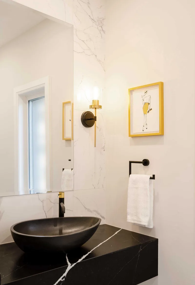 Chic Modern Bathroom Renovation with Gold Accents - Image 5
