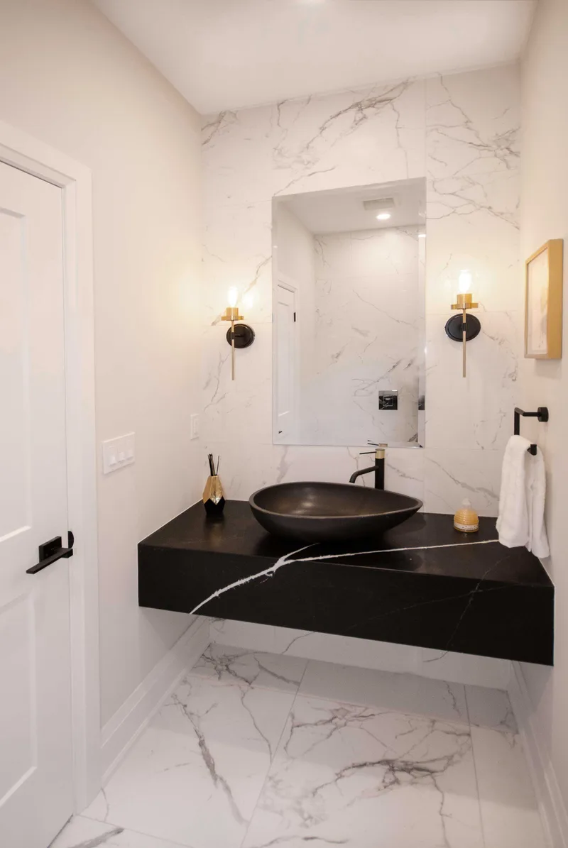 Chic Modern Bathroom Renovation with Gold Accents - Image 7