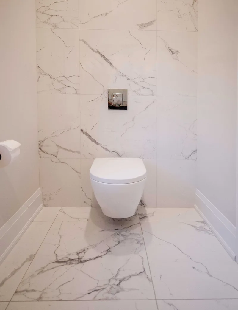 Chic Modern Bathroom Renovation with Gold Accents - Image 8