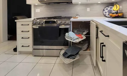 Compact Kitchen with Textured Backsplash - Image 4