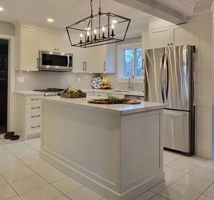 Compact Kitchen with Textured Backsplash - Image 6
