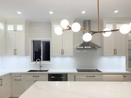 Kitchen with Rose-Gold Chandelie - Image 1