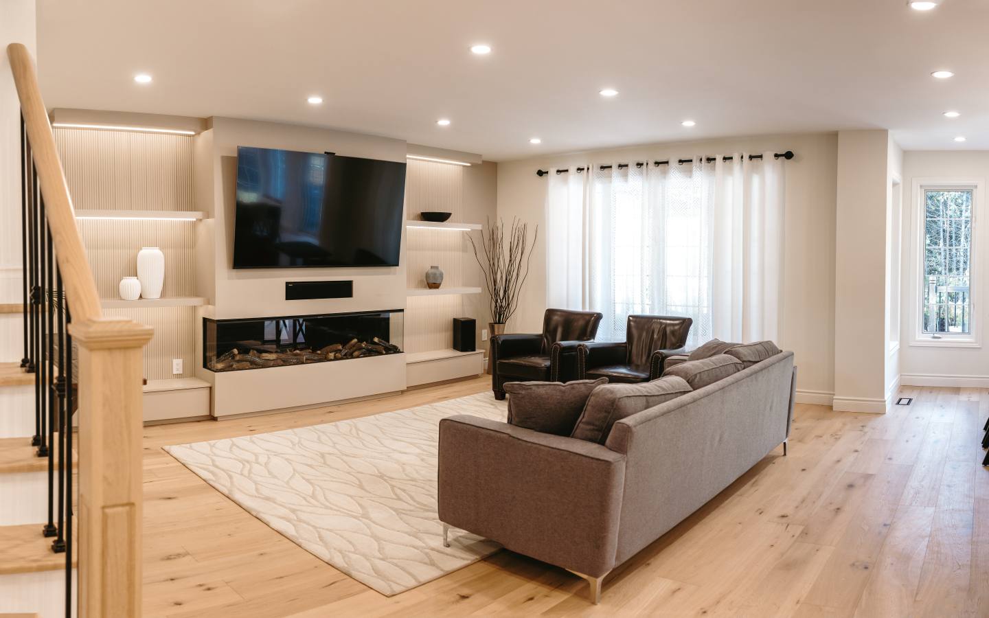 Custom TV unit with dimmable lighting in Whitby living space